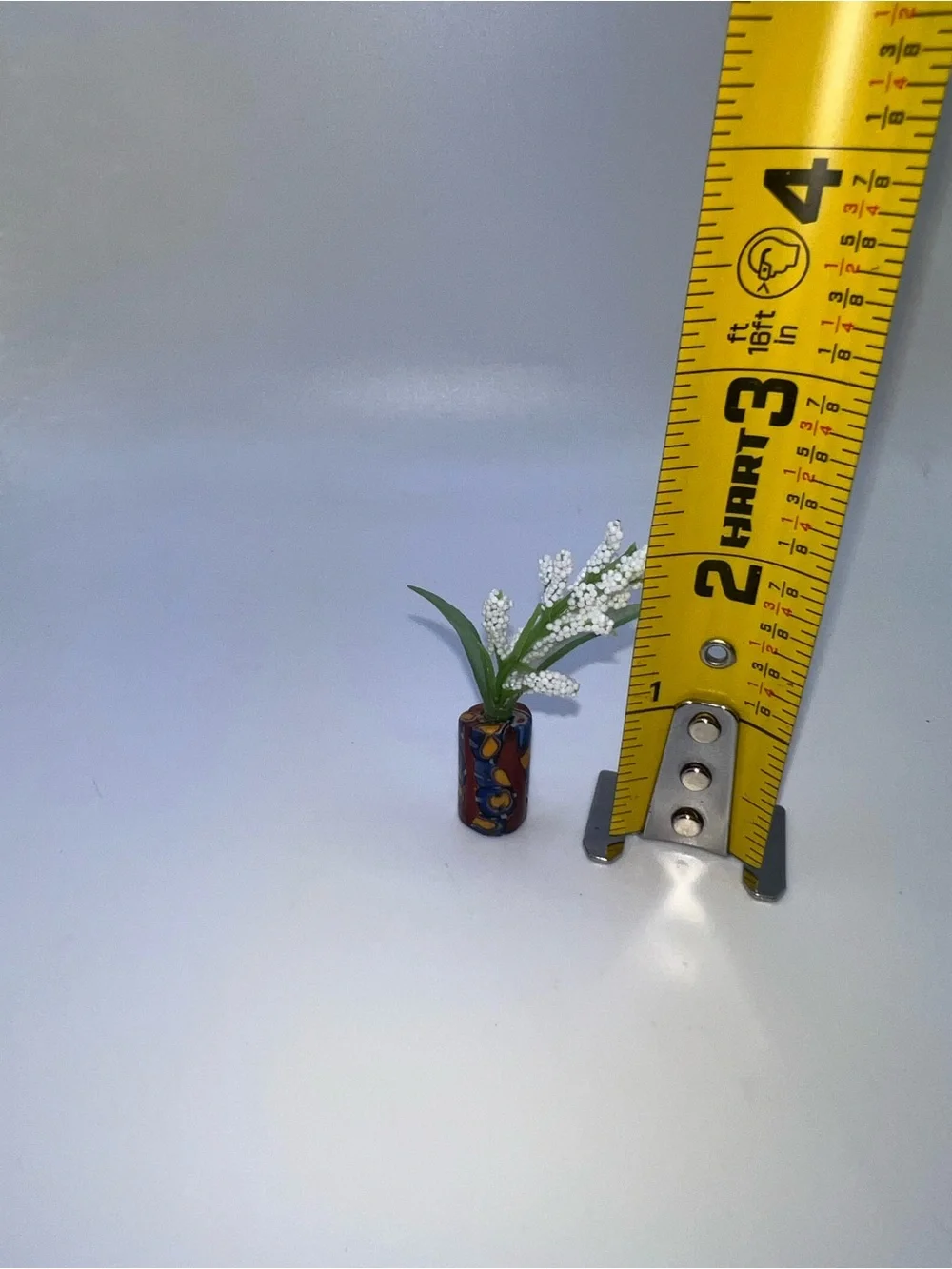 Miniature Decorative Vase with White Floral Spray